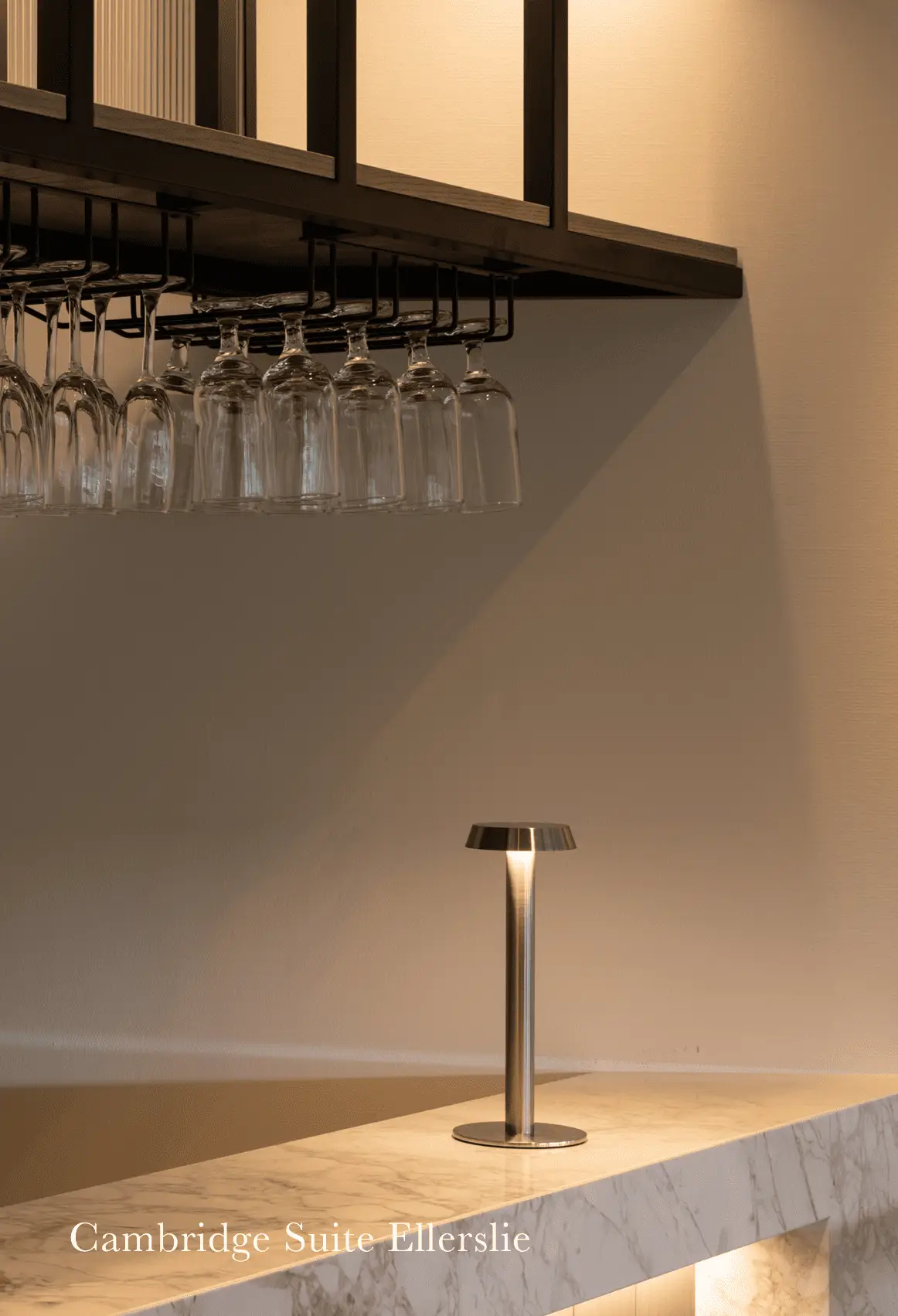 Hospitality suite with lounge seating and racetrack views