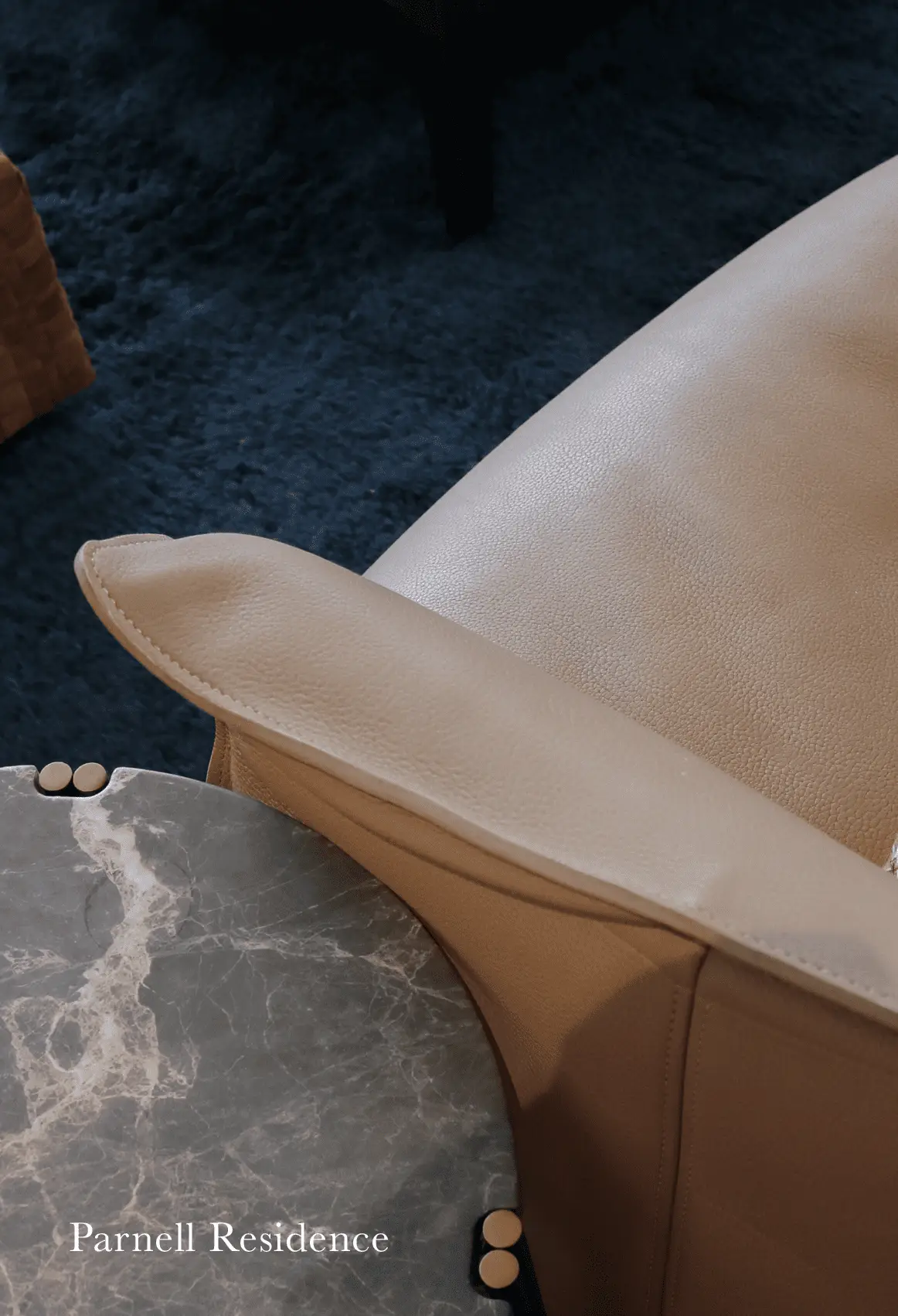 Residential lounge with fireplace and sculptural furniture