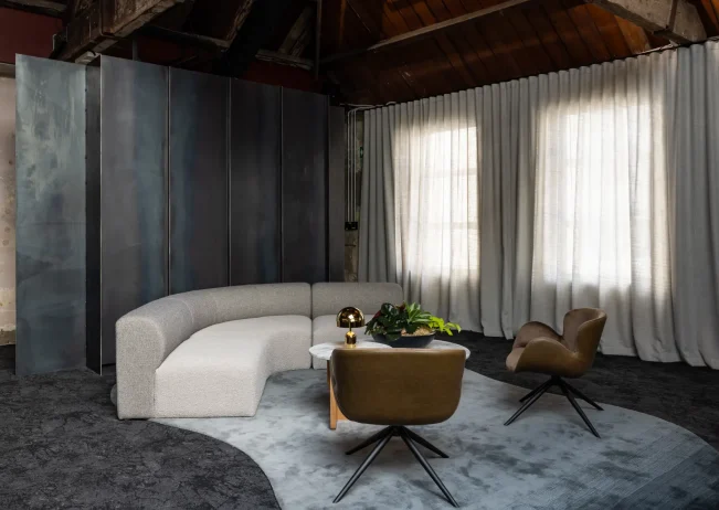 Cube Credit lounge area with soft seating and bespoke bar in historic Imperial Lane building