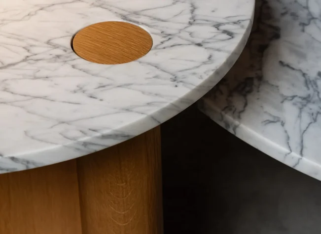 Boardroom at Cube Credit with glass walls and timber beam accents
