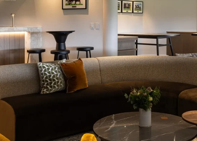 Framed Cambridge Stud memorabilia displayed in hospitality suite