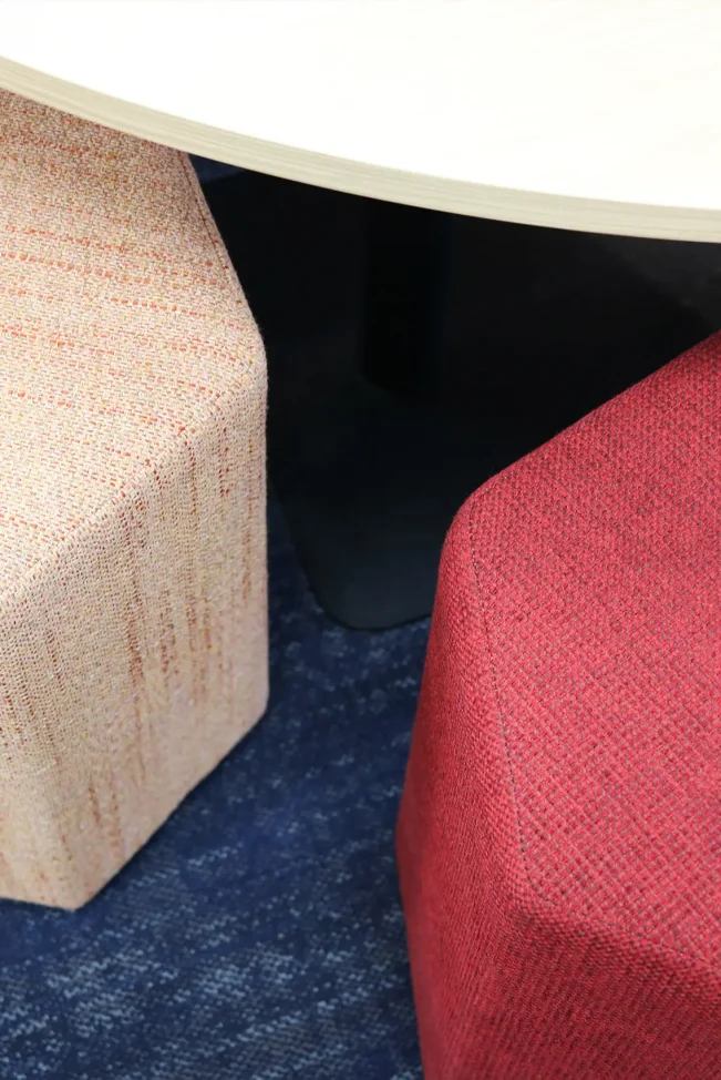 Cube-style upholstered seats in Mafic Partners office