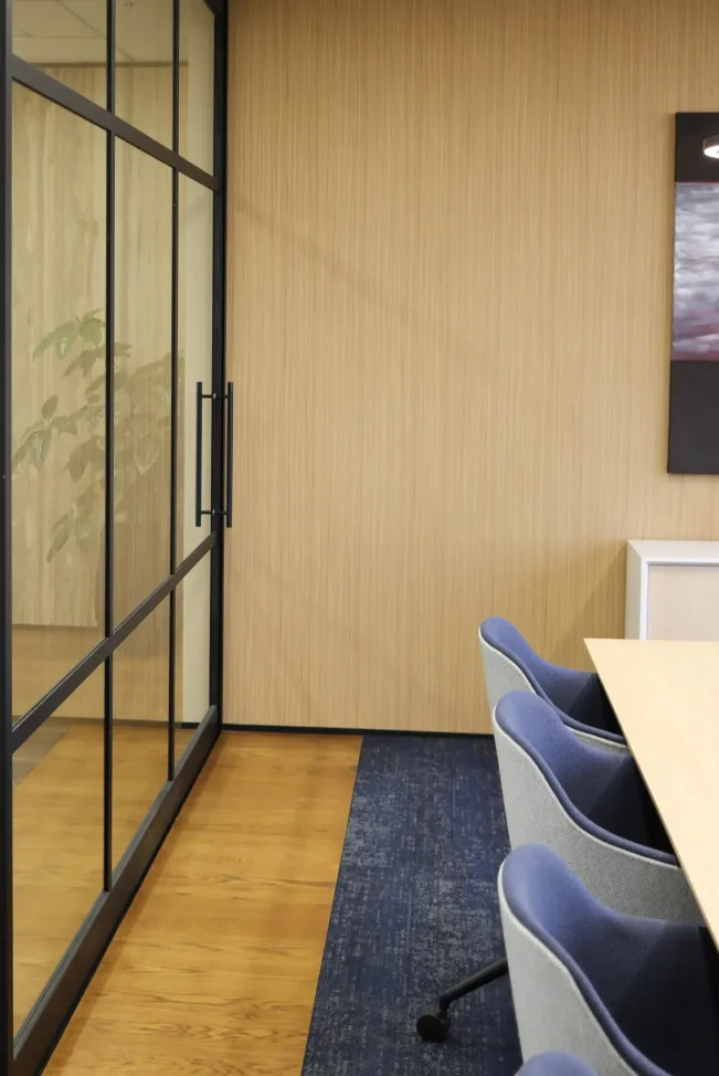 Boardroom chairs with timber sliding door in Mafic Partners office
